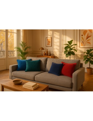 Ensemble coussins en velours côtelé sur canapé gris